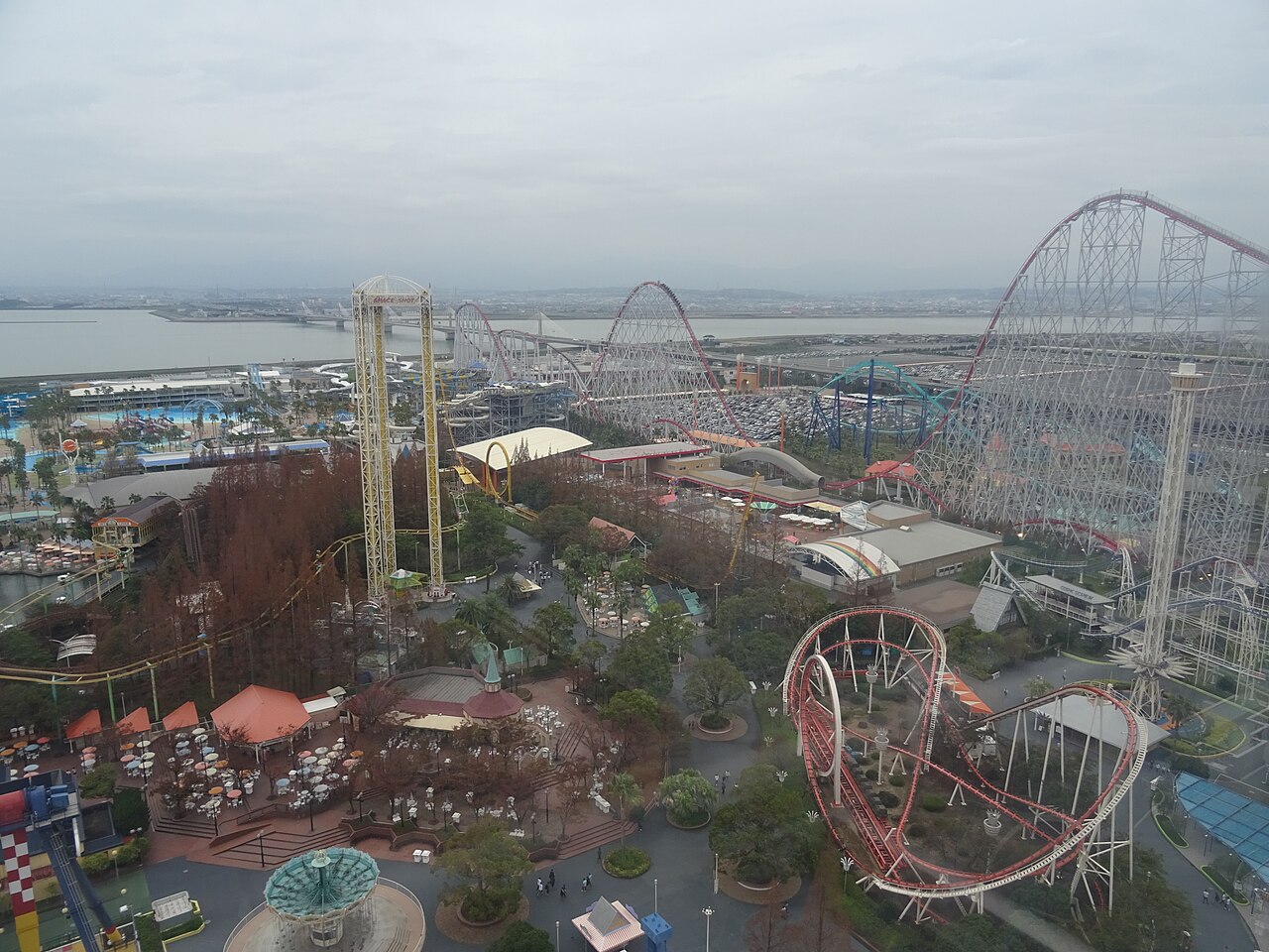 Overview of Nagashima Spa Land amusement park showing multiple ride silhouettes