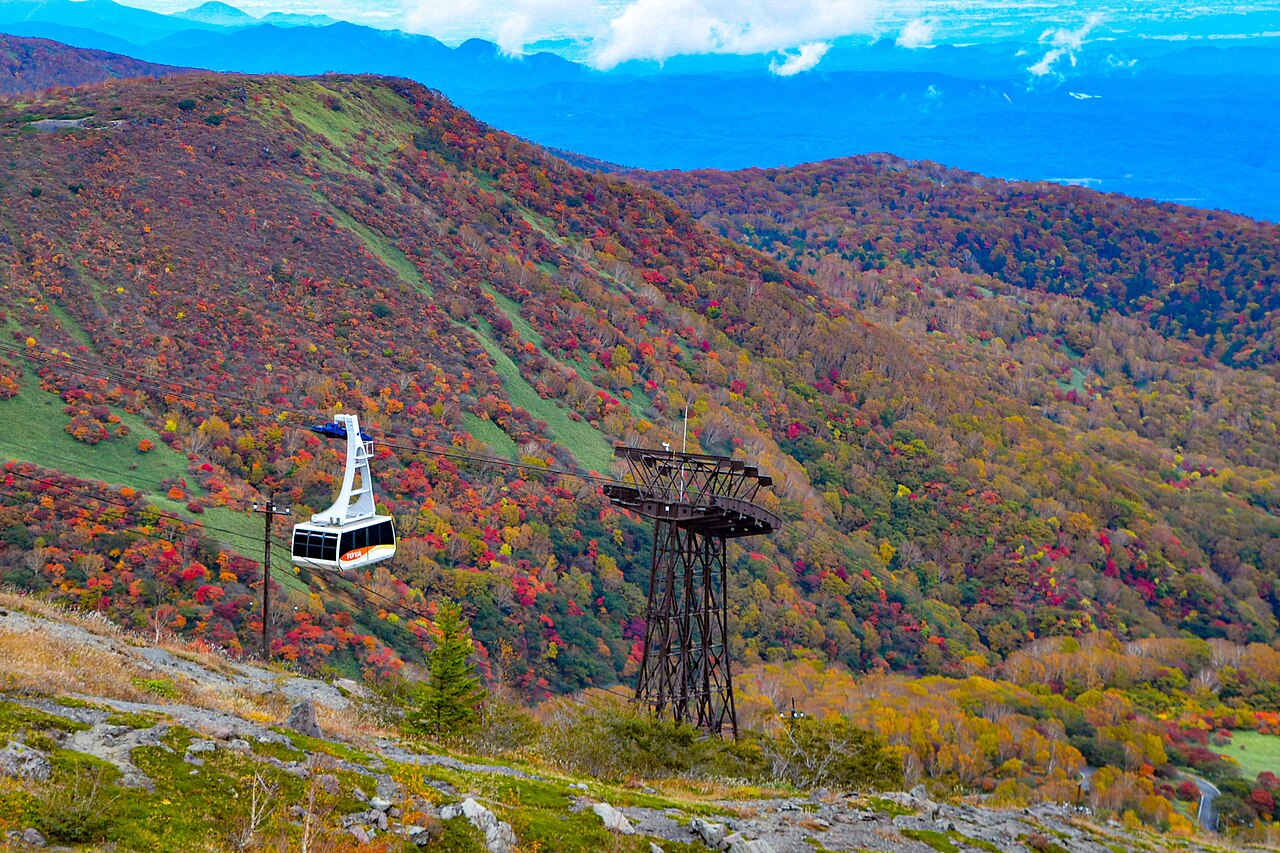 Mt Nasu in autumn colors with red and orange foliage covering the slopes
